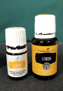 Image of two bottles. Text on bottles: Lemon (essential oil)